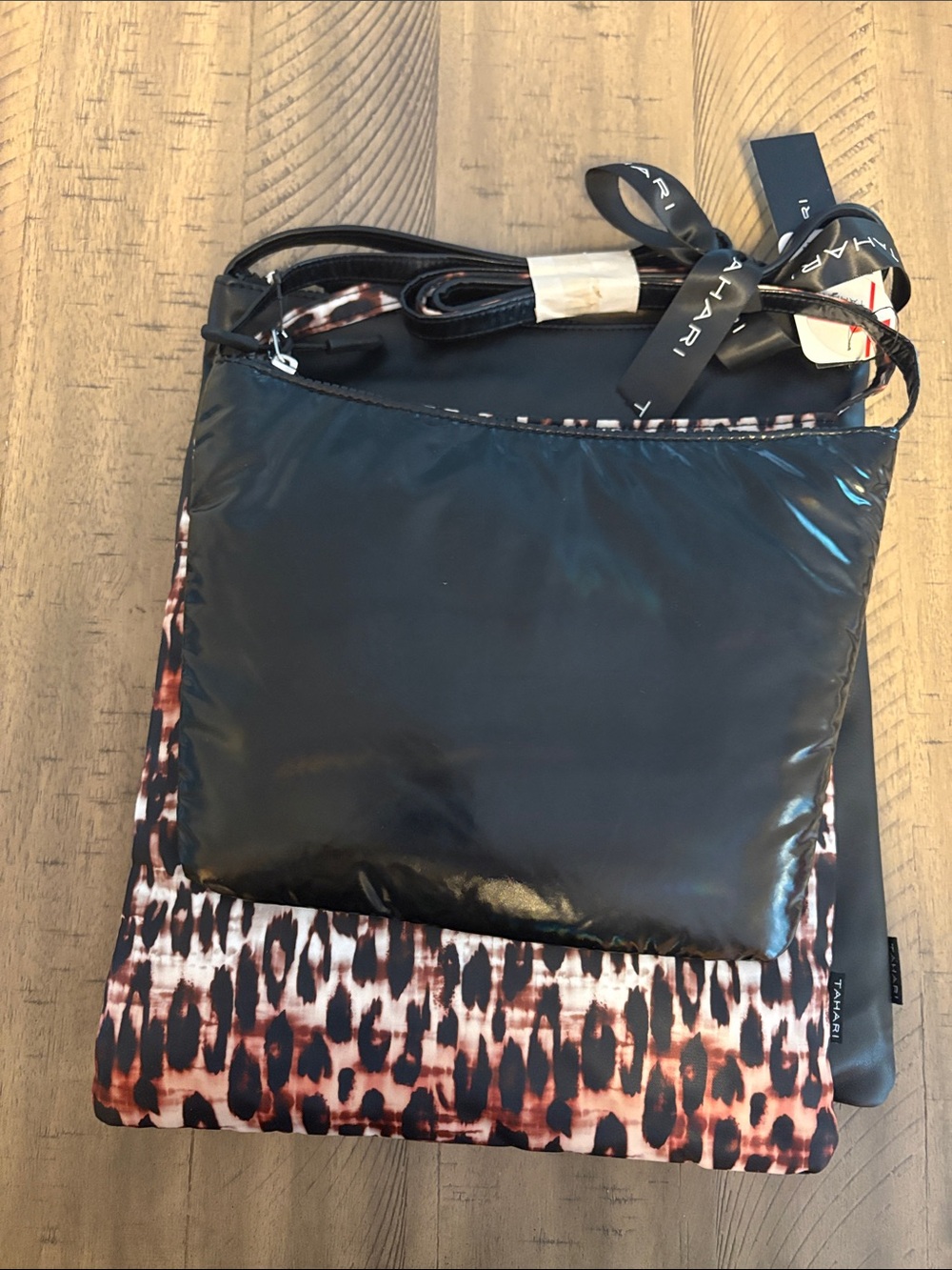 642 Tahari Black Crossbody with Brown Leopard-Print bag and small black bag